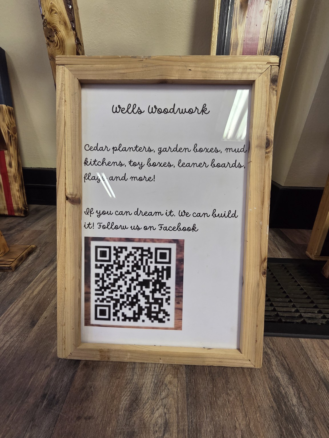 Wells Woodwork info sign with QR code